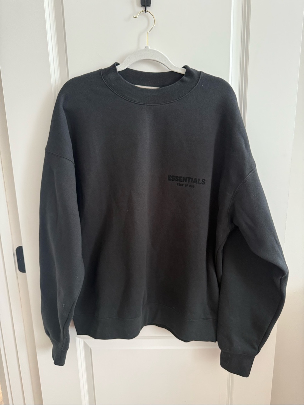 Essentials Men's Black Crewneck Sweatshirt with Subtle Logo